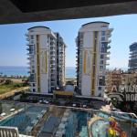 ID 5196 Appartement 1+1 élégant en bord de mer à Mahmutlar