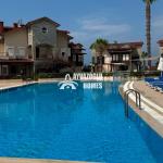 ID 5312 Located in the Türkler area, **just 200 meters from the sea**, this spacious **2+1 apartment**