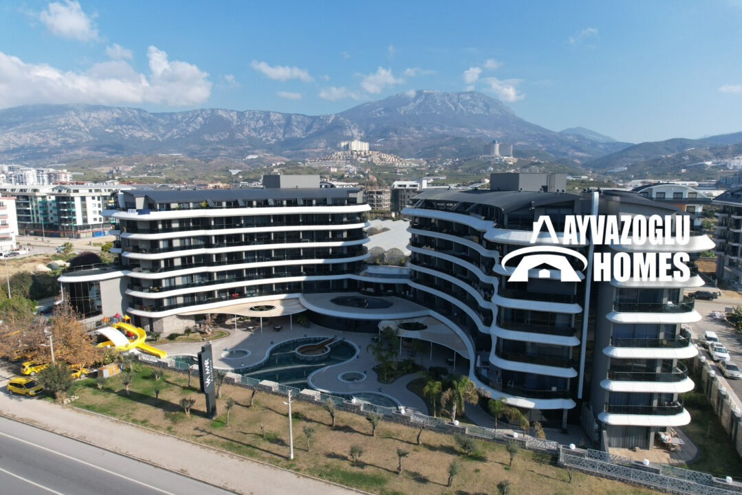 Appartement 1+1 dans un complexe d'élite sur la première ligne de côte