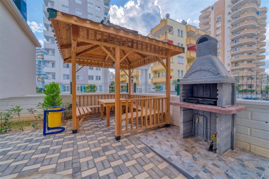 Appartement moderne 1+1 au cœur de Mahmutlar est un choix idéal pour vivre au bord de la mer