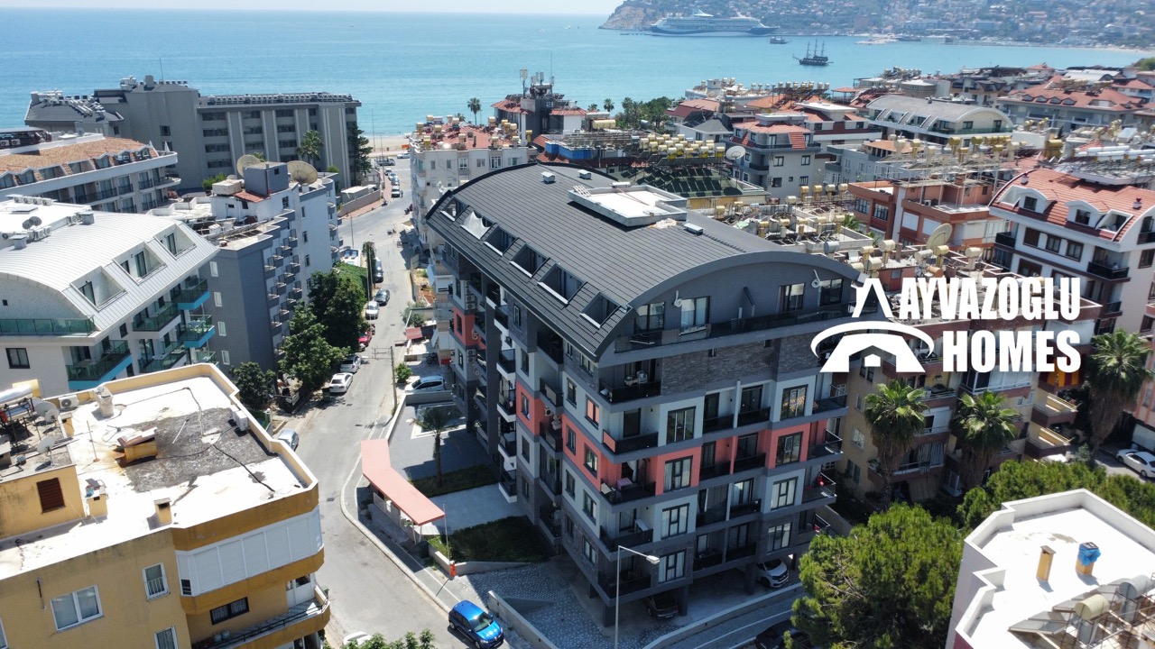 Appartement 1+1 à Tosmur — à seulement 100 mètres de la mer, confort et infrastructures pour 97 000 €